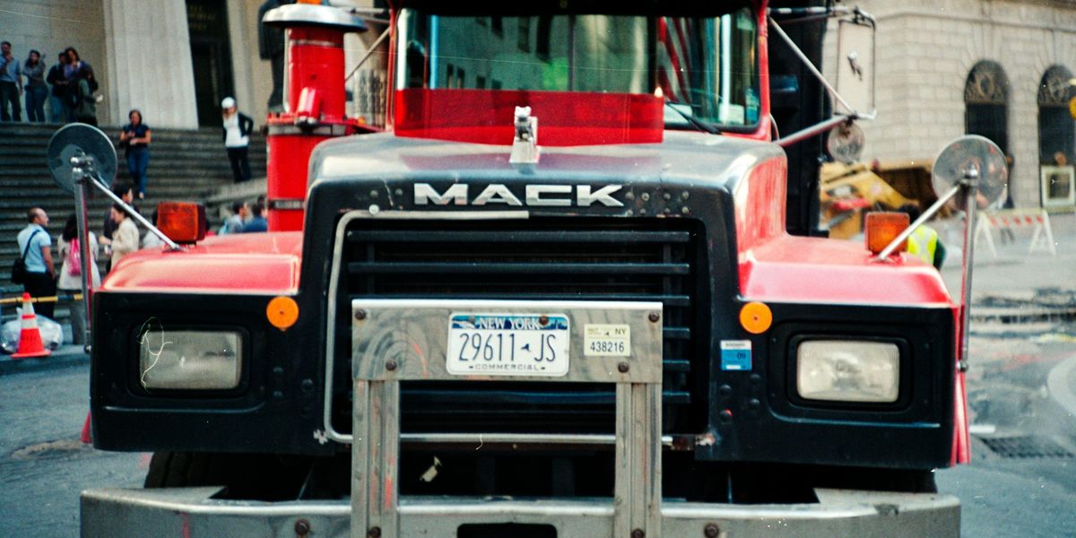 Trucking industry giant blames Trump tariffs in layoff of hundreds of workers